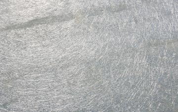 Plumley laminate fibreglass or shingles?