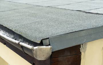repair or replace Plumley flat roofing?